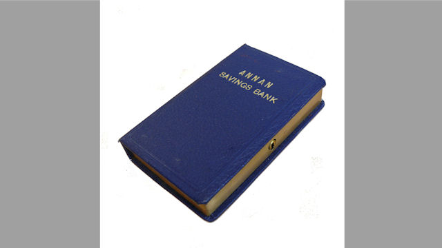 Book-shaped home safe issued by Annan Savings Bank, c.1950 © RBS 2018 Book-shaped home safe issued by Annan Savings Bank, c.1950 © RBS 2018