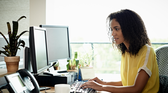 Our brands Customer at home browsing at computer