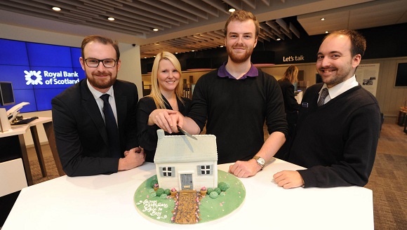 RBS Help to Buy team cutting cake
