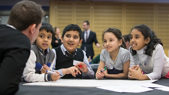 Children learning at MoneySense event