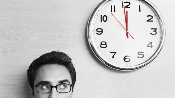 Clock watching employee