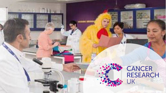 Cancer Research image of people in a research room