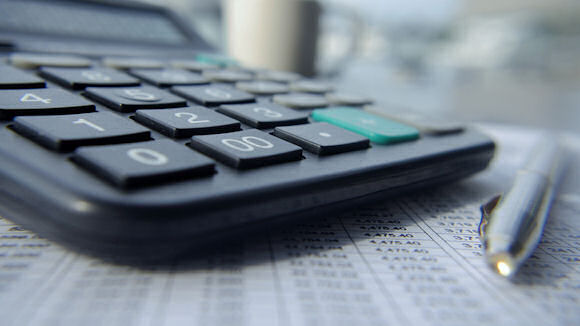 calculator, paper and pen