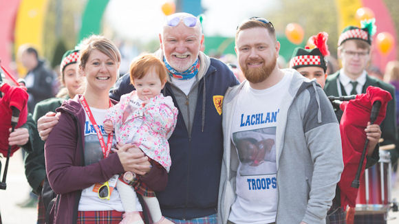 Sir Tom Hunter with participants of the Royal Bank of Scotland Kiltwalk in Glasgow